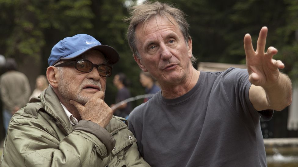 Italian film producer Dino De Laurentiis (1919 - 2010) (left) with director David Leland (right) on the set of 'Virgin Territory' in Italy, 2007