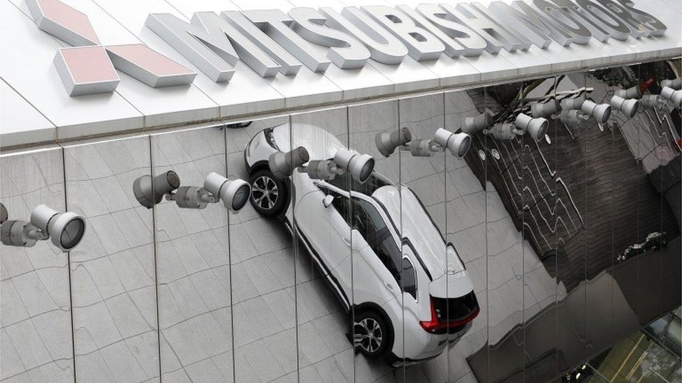 Mitsubishi Motor sign/car