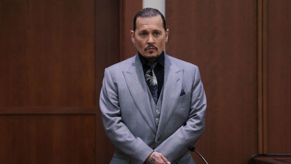 Actor Johnny Depp takes a stand during his defamation trial against his ex-wife Amber Heard at the Fairfax County Circuit Courthouse in Fairfax, Virginia, April 20, 2022