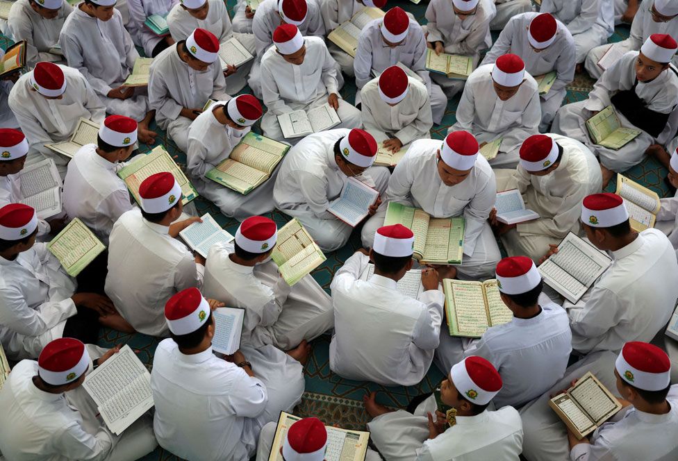 Koranic students of an Islamic boarding school read the Quran on the day of "Nuzul Quran" or "Quran Revelation Day", on the 17th day of Ramadan, in Kuala Lumpur, Malaysia March 28, 2024.