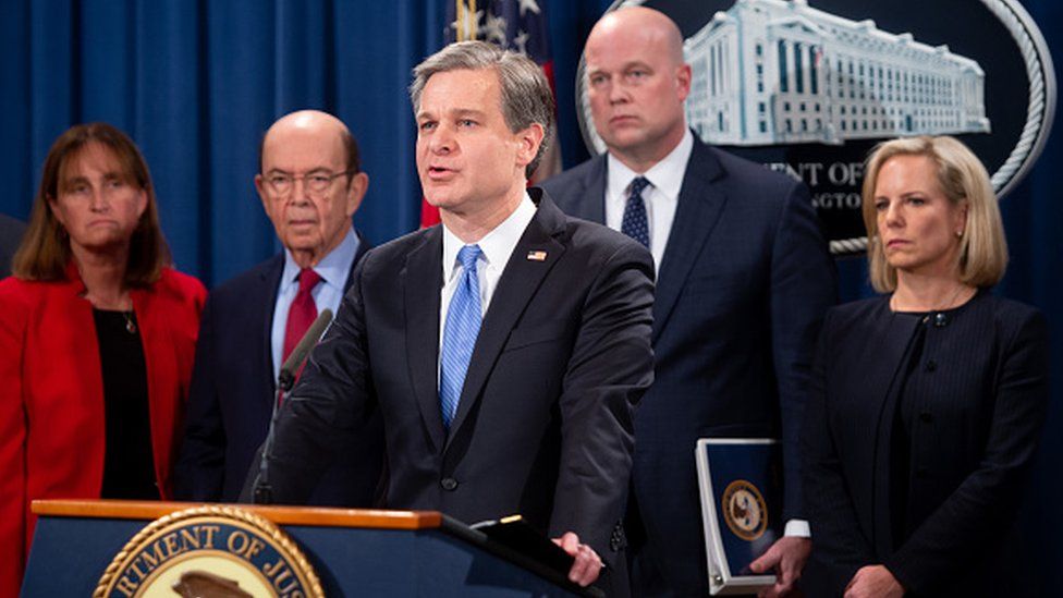 FBI Director Christopher Wray speaks at a news conference