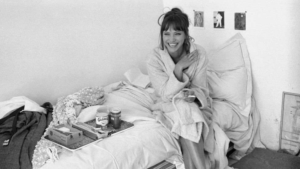 Anna Karina laughing on the set of Pierrot le Fou