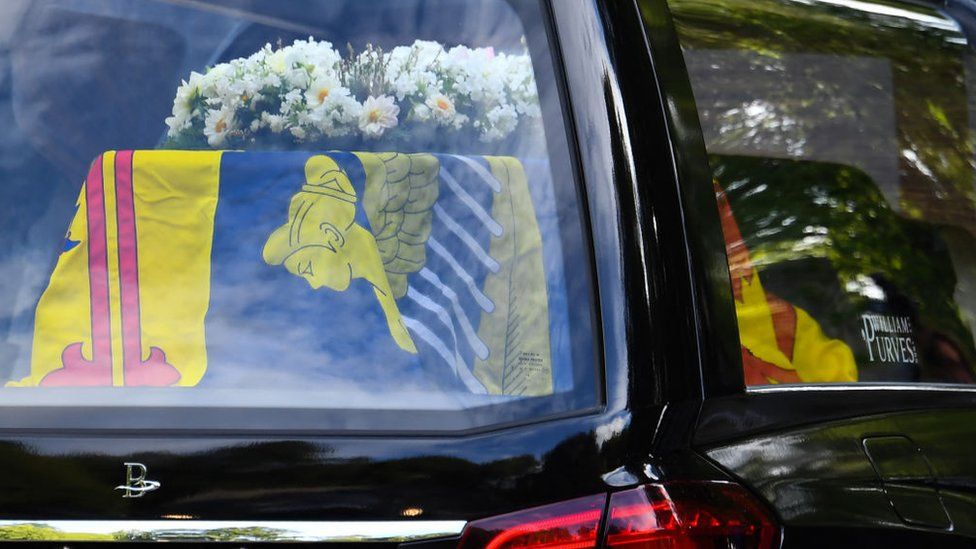 The Queen's funeral cortege is seen leaving Balmoral Castle