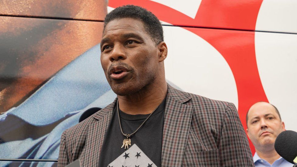 US Republican Senate candidate for Georgia, Herschel Walker speaks to media at a campaign event on September 9, 2022