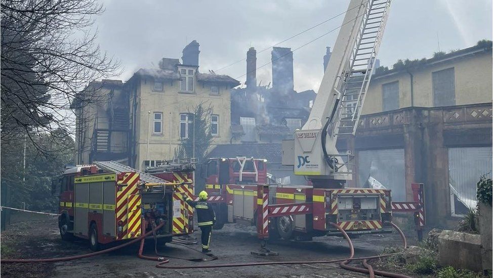 Fire services putting out a fire at the old council offices