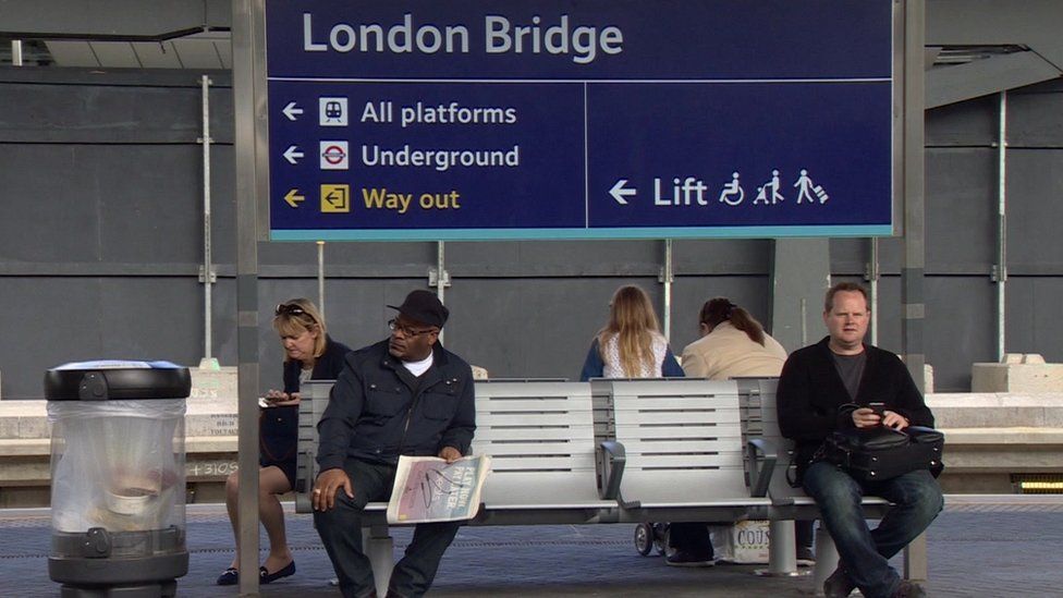 Passengers waiting at station