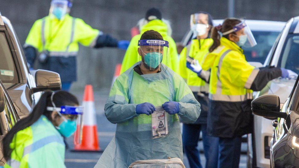 Australia Covid: Outbreaks emerge across country in 'new phase' of pandemic - BBC News