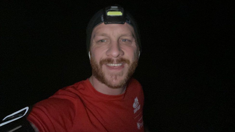 Joe Wainman selfie on a run in the dark