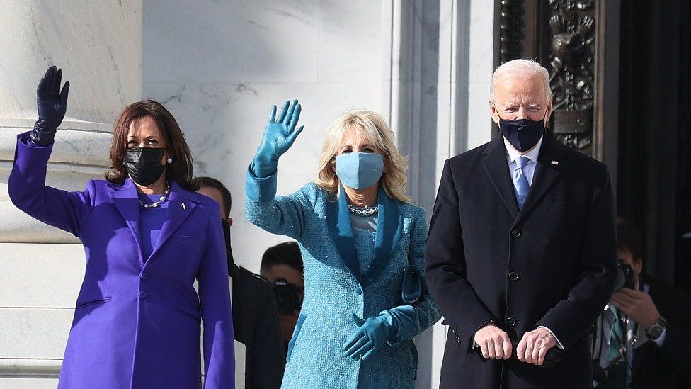 Kamala Harris (L), Jill Biden (C) and Joe Biden on Capital Hill before their grand opening