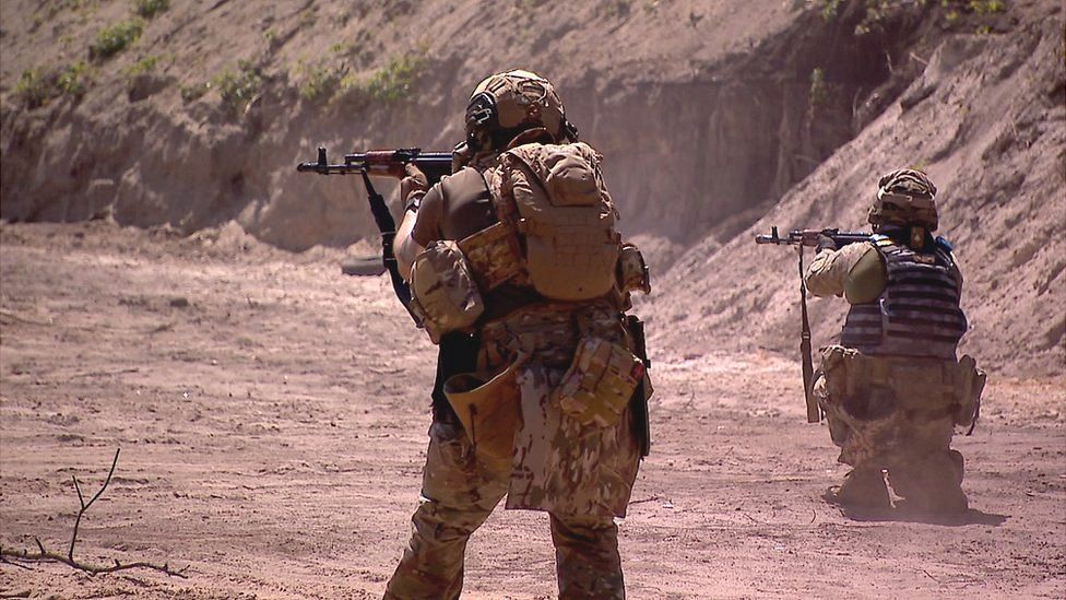 Ukrainian soldiers training with AK-47 assault rifles