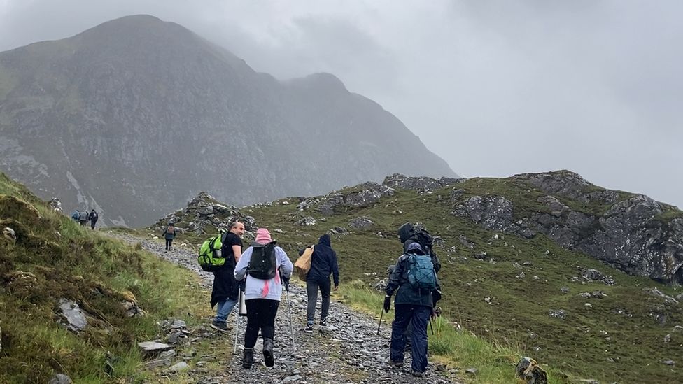 Muslim converts making their way through the Scottish Highlands