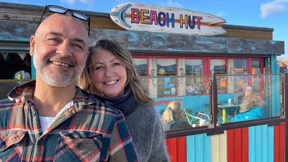 Bertie and Sandie Menezes outside Beach Hut in Great Yarmouth, Norfolk