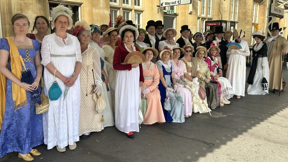 Jane Austen Festival attendees line the platform at Bath Spa Station