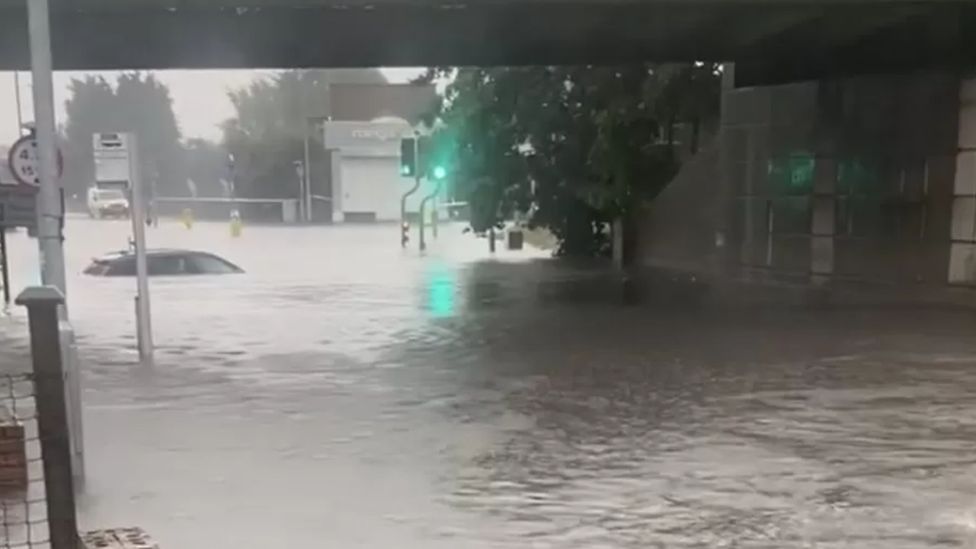 A car submerged in water after flooding in Worksop, Nottinghamshire