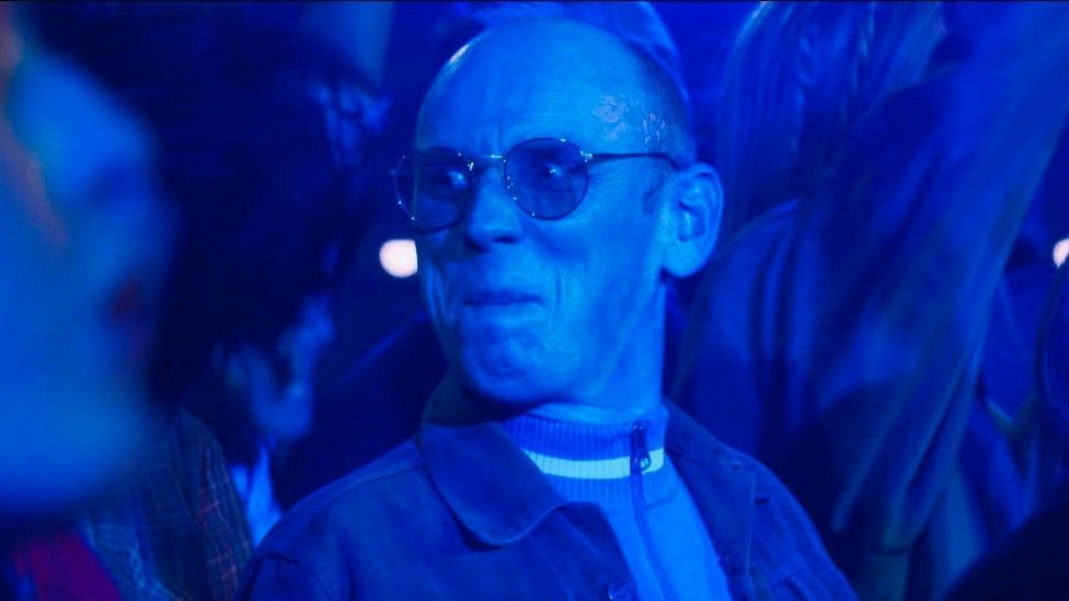Creation Records boss Alan McGee, played by Ewan Bremner, raving in a film scene from Creation Stories