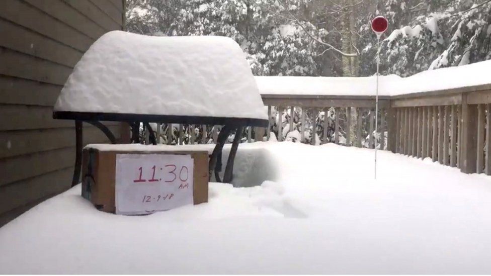 Snow hits a porch in Banner Elk, North Carolina