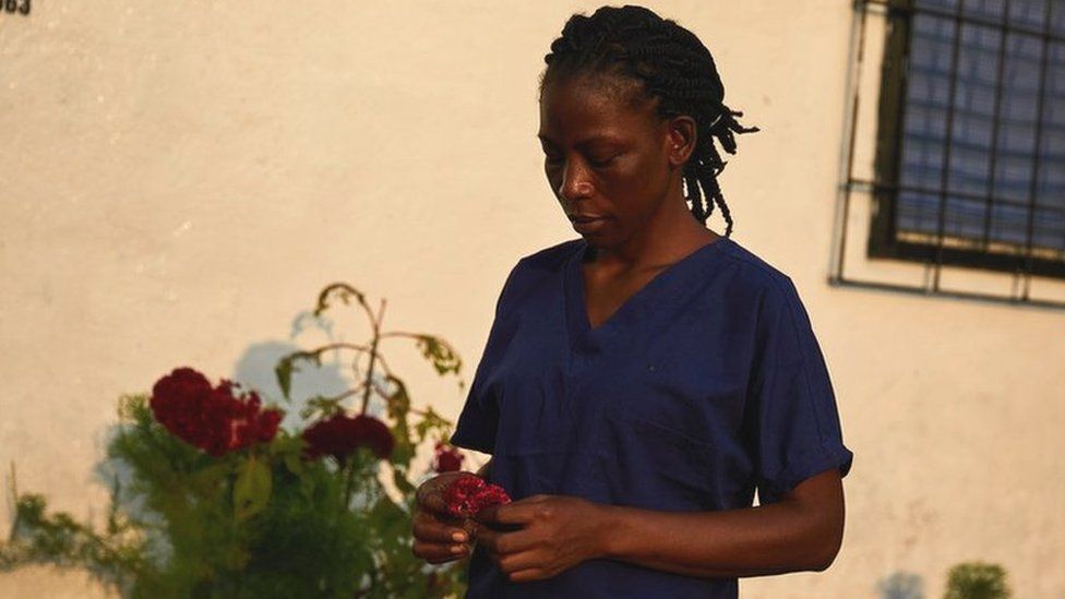 Etta Roberts works as a nurse at the Kahweh clinic.