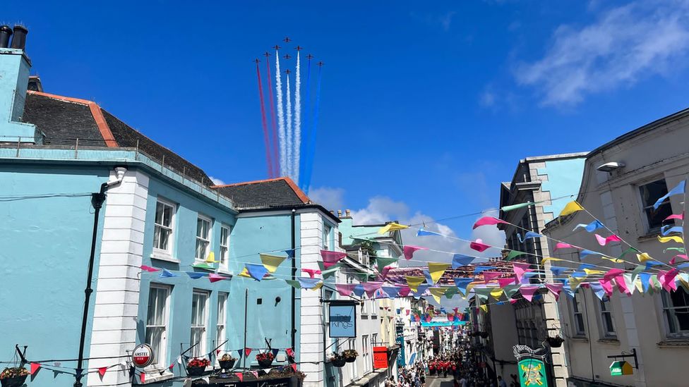 The Red Arrows in the skies above the town
