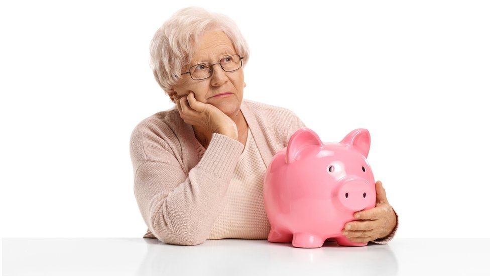 woman and piggy bank