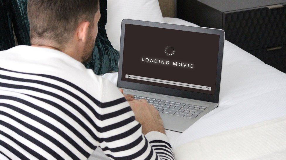 Man downloading a movie