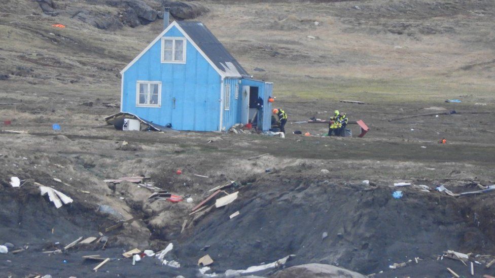 The surge of water is also reported to have swept away 11 homes in the village of Nuugaatsiaq, Geenland