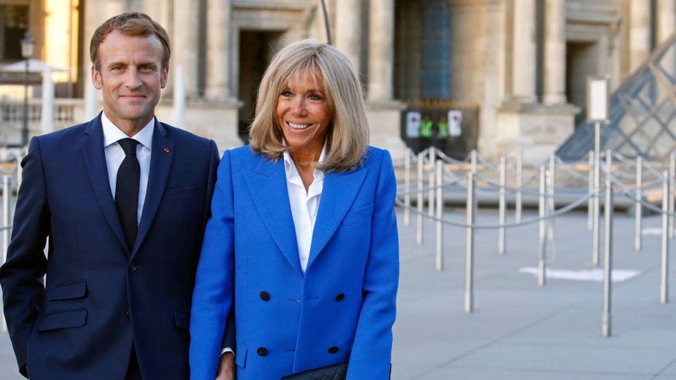 French President, Emmanuel Macron and his wife Brigitte Macon at exhibition opening