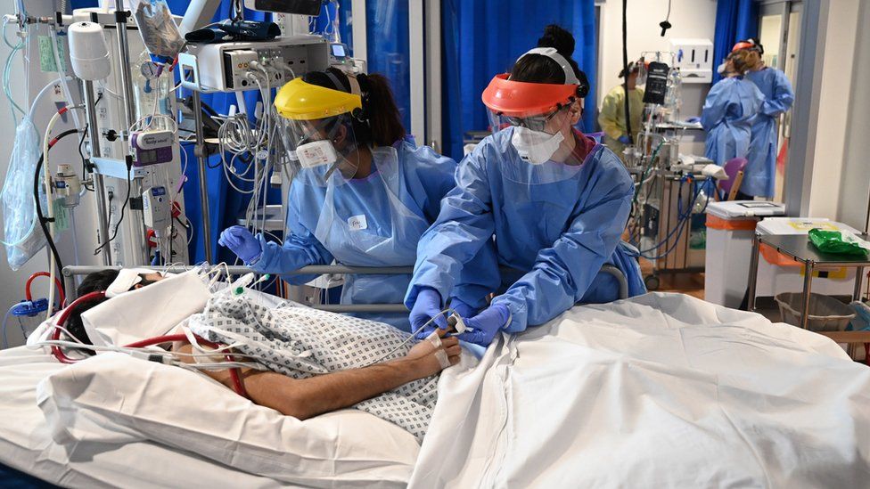 nurses treating a patient