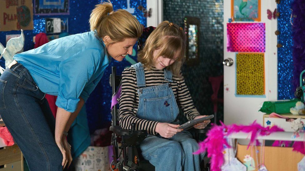 Sharon Horgan and Niamh Moriarty looking at a computer tablet, in a scene from BBC One's Best Interests