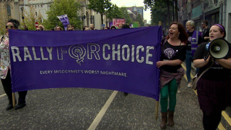 Pro choice marchers make their way through Belfast