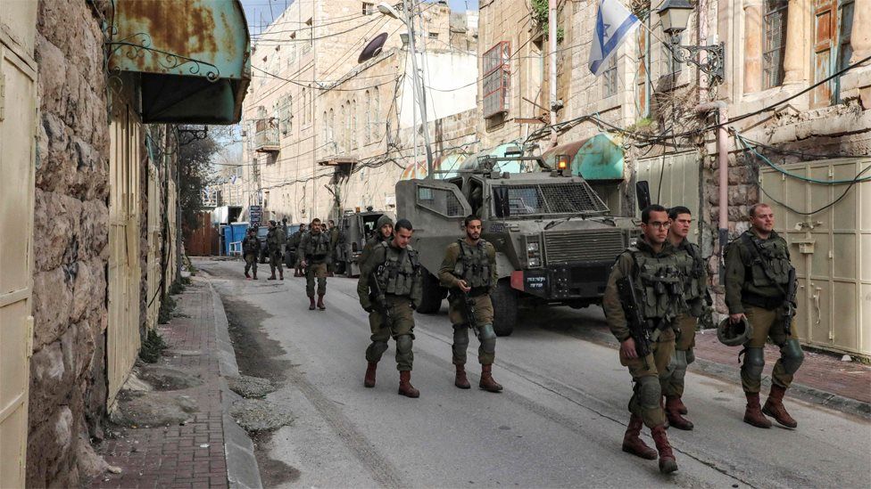 Israeli soldiers patrol Shuhada street in the divided city of Hebron in the occupied West Bank (28 January 2020)