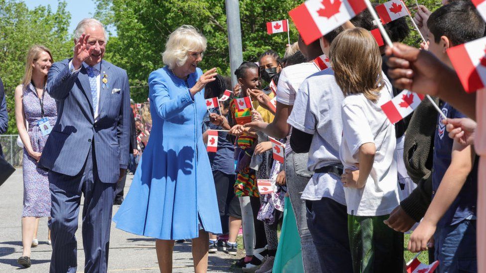 The Prince of Wales and the Duchess of Cornwall meeting schoolchildren