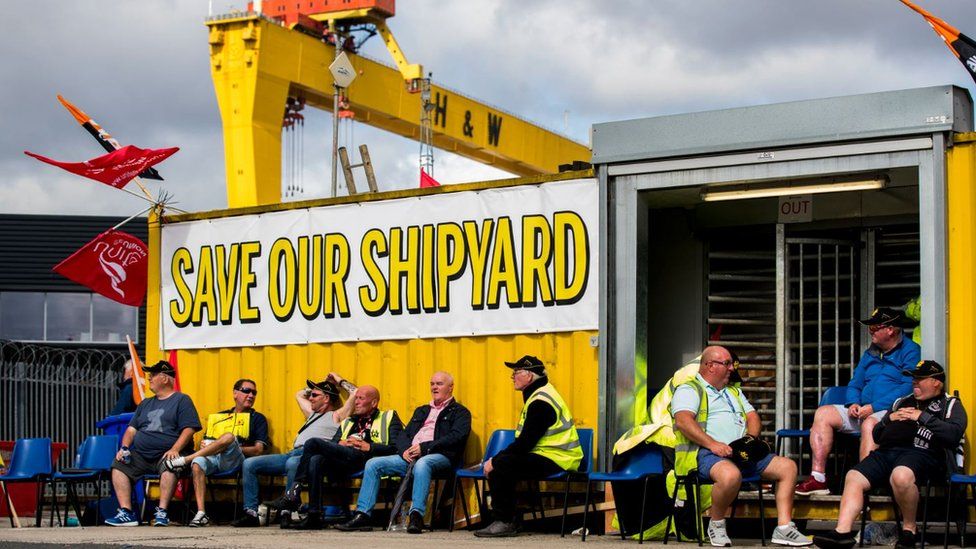Employees of Harland and Wolff during their protest at the gates of the shipyard in Belfast, waiting to hear if there will be a last minute deal to keep the business from closing,