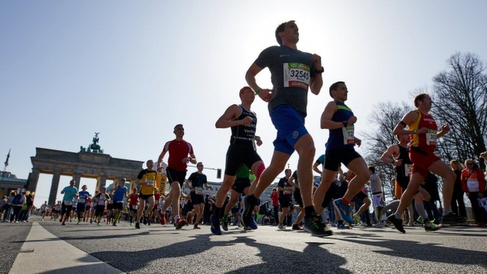 Runners close to Brandenburg gate at Sunday's half-marathon in Berlin