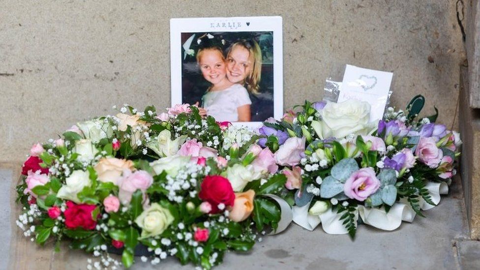Flowers laid in the September 11 Memorial Garden in Grosvenor Square, London