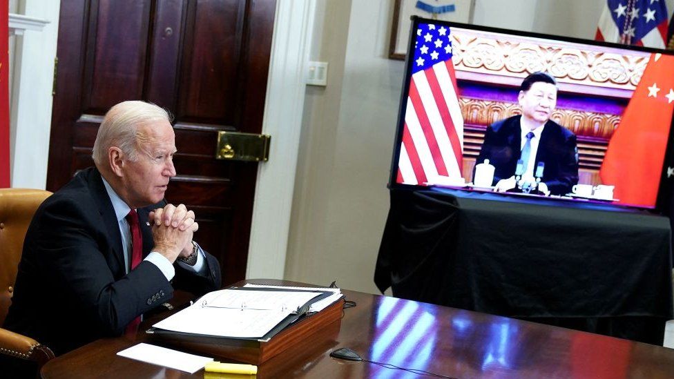 US President Joe Biden meets with China's President Xi Jinping during a virtual summit in 2021