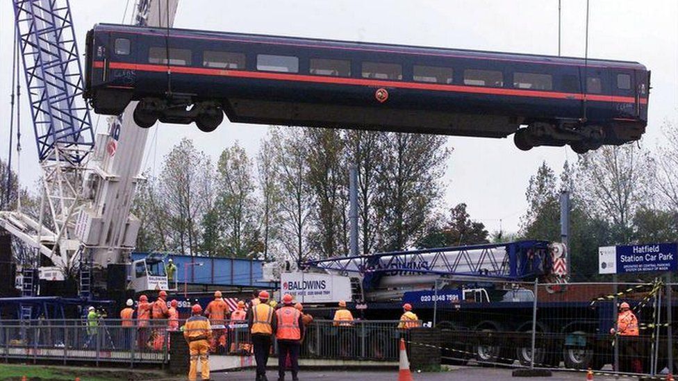 A carriage lifted from the scene of the Hatfield rail crash