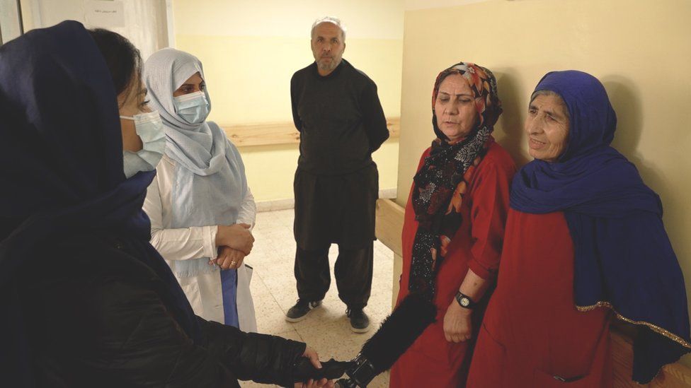 Hospital workers in a Kabul hospital speak to the BBC's Yalda Hakim