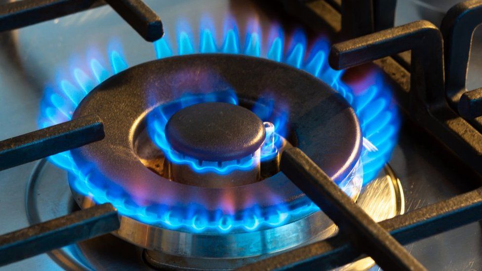 A blue flame on a gas hob