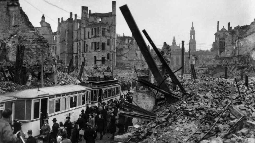 Commuters boarding a tram in bomb-damaged Dresden in March 1946