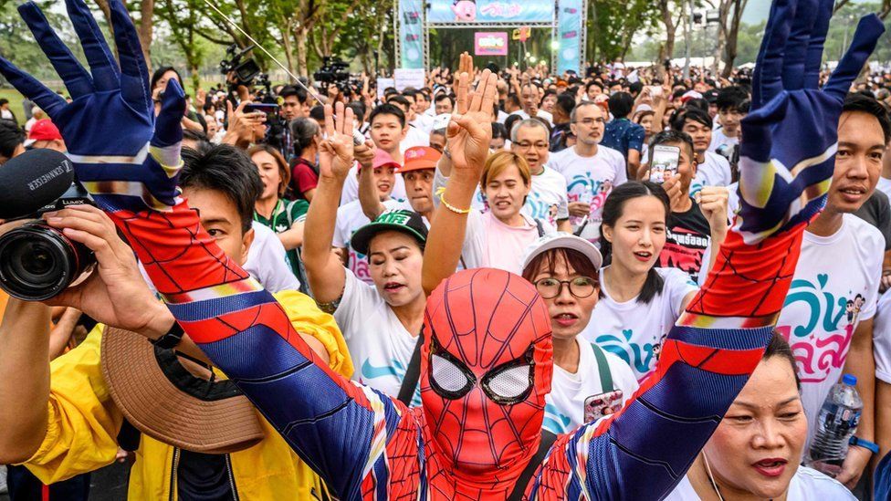 A man dressed as Spider-Man takes part in a "run against dictatorship" in Bangkok