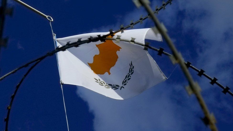 Cyprus flag flies over abandoned guard post in Nicosia