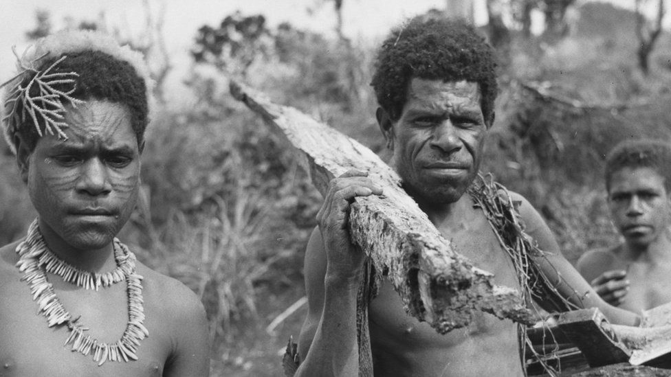 Father and son in Papua New Guinea's eastern highlands