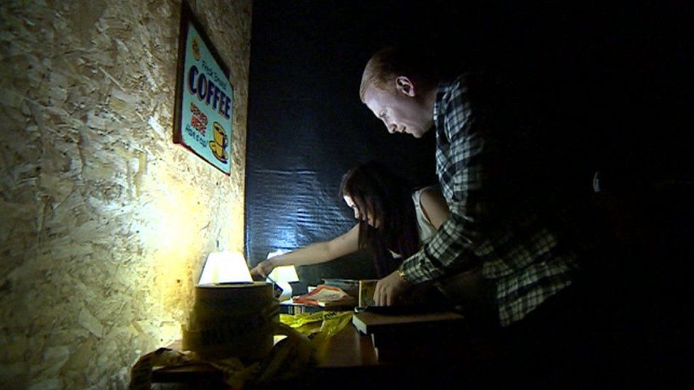 People taking part in an escape game