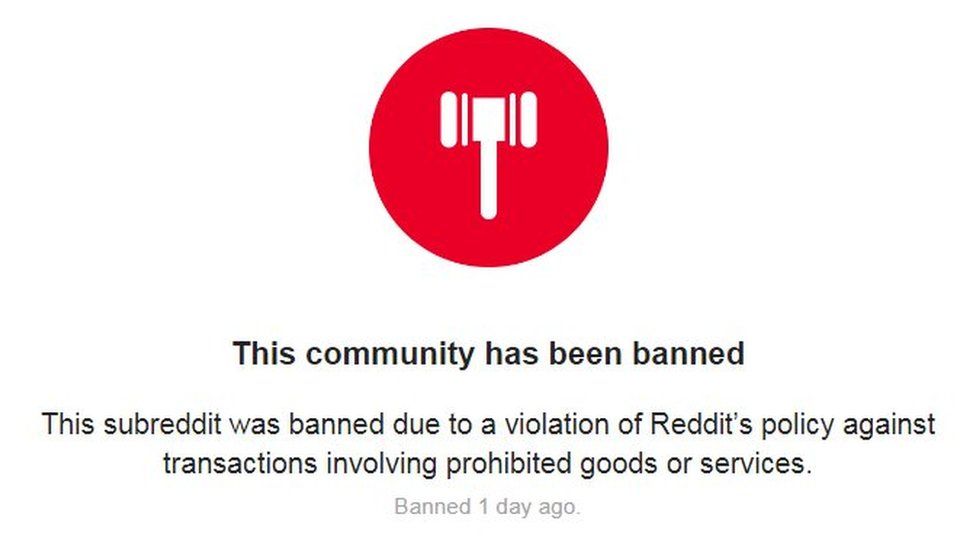 A red circle with a white hammer in it, accompanied with the text: "This community has been banned. This subreddit was banned due to a violation of Reddit's policy against transactions involving prohibited goods or services. Banned 1 day ago."
