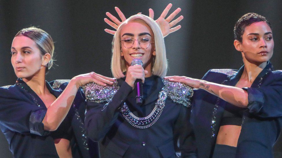 Bilal Hassani on stage with dancers