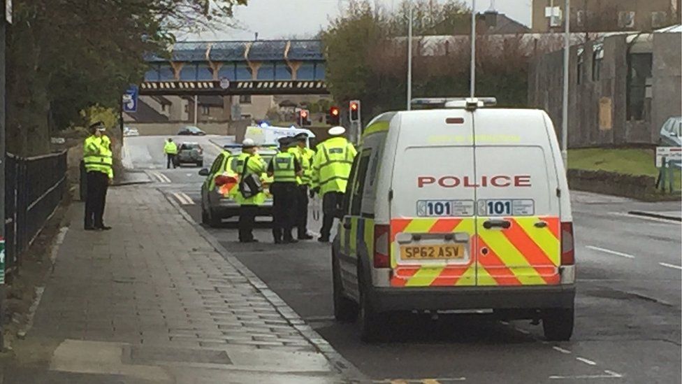 Man knocked down by marked police car in Fife BBC News