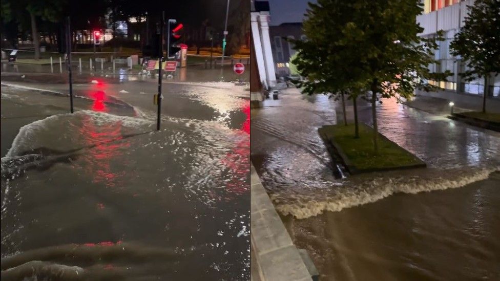 Image of water flooding down road