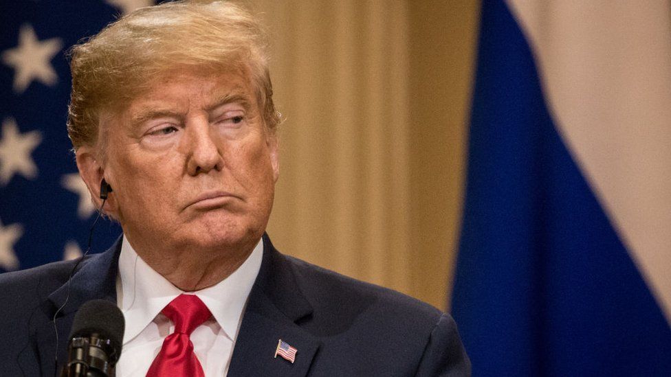 U.S. President Donald Trump answers questions about the 2016 U.S Election collusion during a joint press conference with Russian President Vladimir Putin after their summit on July 16, 2018 in Helsinki, Finland.