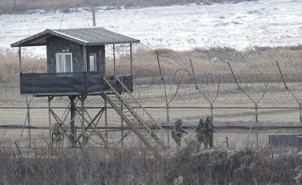 In this 23 Jan 2016, photo, South Korean army soldiers patrol along the barbed-wire fence in Paju, near the border with North Korea, South Korea. North Korea has declared plans to launch an earth observation satellite later this month, an official with the London-based agency International Maritime Organization, said late Tuesday, Feb. 2, 2016.
