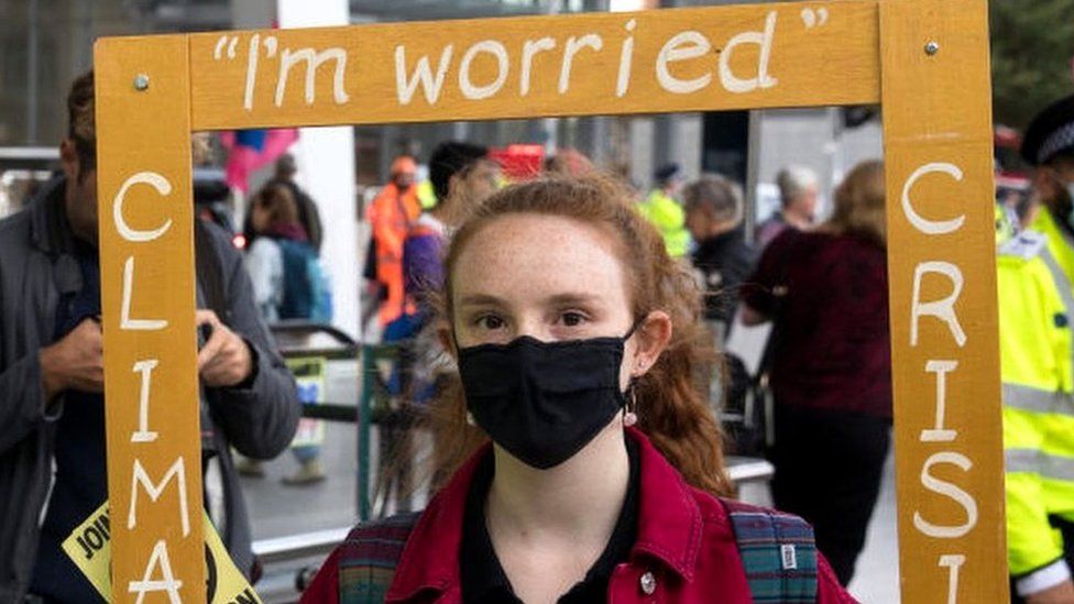 Environmental activists from Extinction Rebellion assemble outside London Bridge station